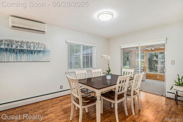181 S Josephine Ave, Pontiac, MI 48341 - dining space featuring an AC wall unit, baseboard heating, healthy amount of natural light, and wood finished floors