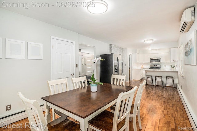 181 S Josephine Ave, Pontiac, MI 48341 - dining area with baseboard heating, light wood-style floors, and an AC wall unit