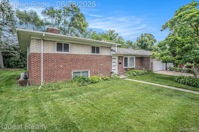181 S Josephine Ave, Pontiac, MI 48341 - split level home featuring a chimney, brick siding, and a front yard