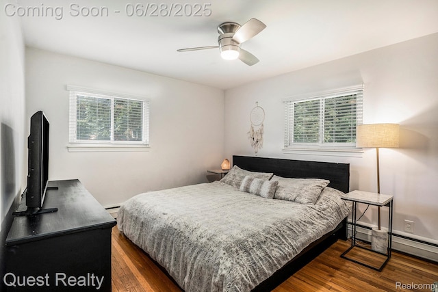 181 S Josephine Ave, Pontiac, MI 48341 - bedroom with wood finished floors, a baseboard heating unit, and a ceiling fan