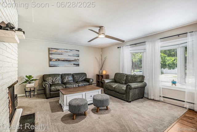 181 S Josephine Ave, Pontiac, MI 48341 - living room featuring ceiling fan, a fireplace, ornamental molding, wood finished floors, and a baseboard heating unit