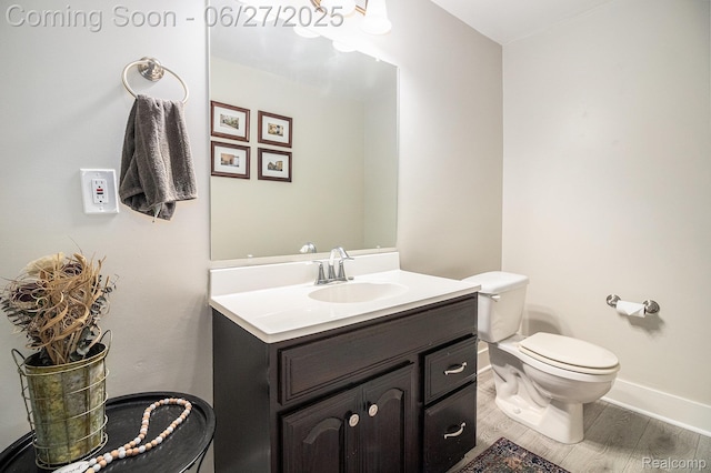832 Townsend Dr, South Lyon, MI 48178 - bathroom featuring vanity and wood finished floors