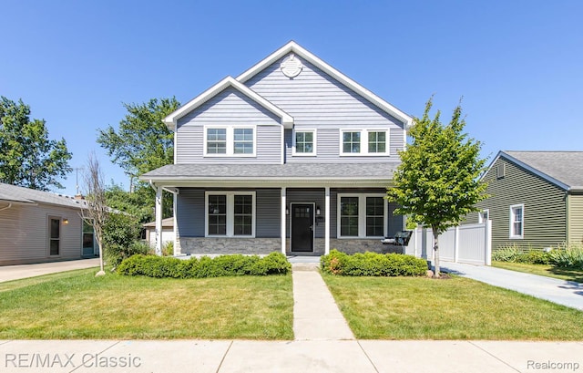 2663 Griffith Ave, Berkley, MI 48072 - view of front of property featuring a front yard, stone siding, and covered porch