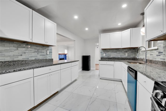 10825 E Outer Dr, Detroit, MI 48224 - kitchen with dishwasher, light marble finish floors, dark stone counters, recessed lighting, and white cabinets