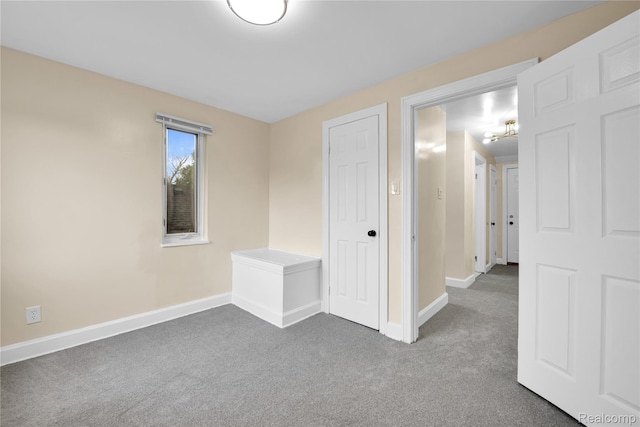 10825 E Outer Dr, Detroit, MI 48224 - unfurnished bedroom featuring carpet floors and baseboards