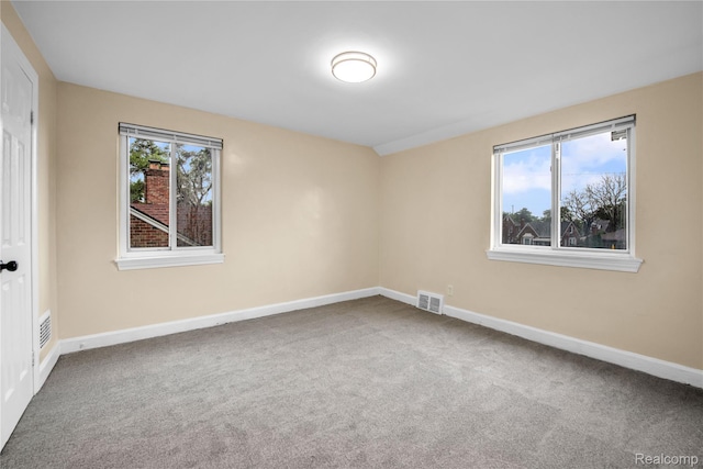10825 E Outer Dr, Detroit, MI 48224 - unfurnished bedroom with baseboards and carpet floors
