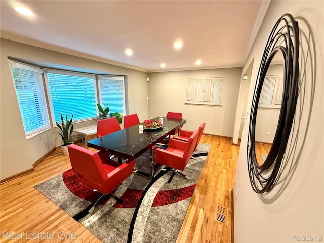2546 Limerick Ln, Troy, MI 48098 - dining space with crown molding, light wood finished floors, and recessed lighting