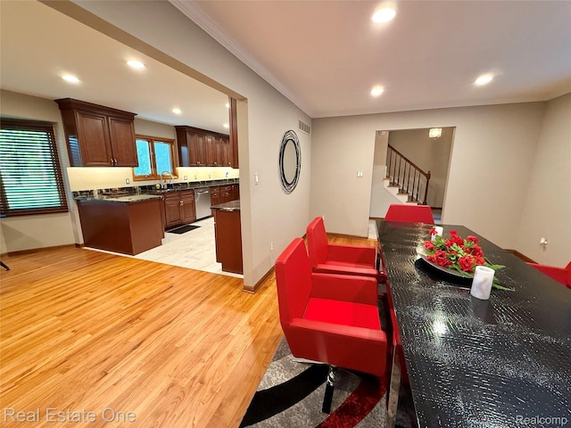 2546 Limerick Ln, Troy, MI 48098 - kitchen with dark countertops, recessed lighting, light wood finished floors, and dishwasher
