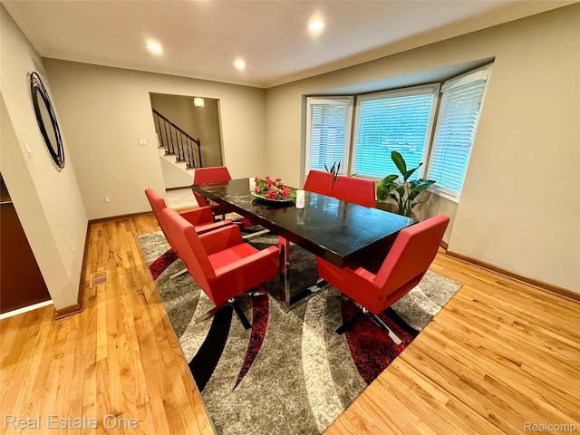 2546 Limerick Ln, Troy, MI 48098 - dining area with stairs, wood finished floors, recessed lighting, and crown molding