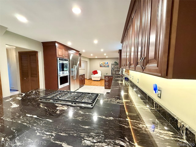 2546 Limerick Ln, Troy, MI 48098 - kitchen featuring appliances with stainless steel finishes, recessed lighting, and dark stone counters