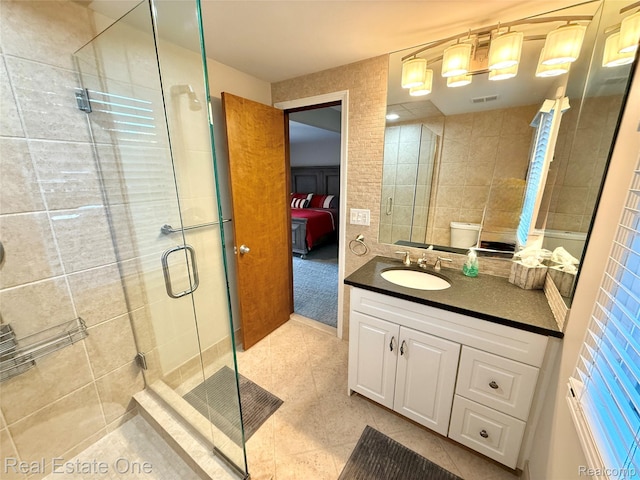 2546 Limerick Ln, Troy, MI 48098 - full bathroom featuring vanity, a shower stall, and tile patterned floors