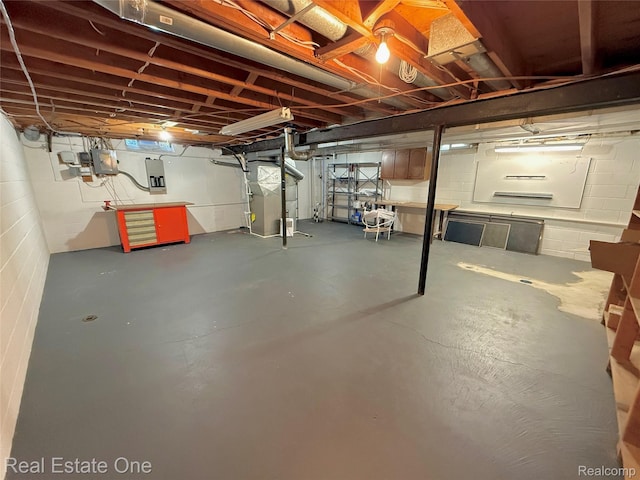 2546 Limerick Ln, Troy, MI 48098 - unfinished below grade area featuring heating unit and concrete block wall