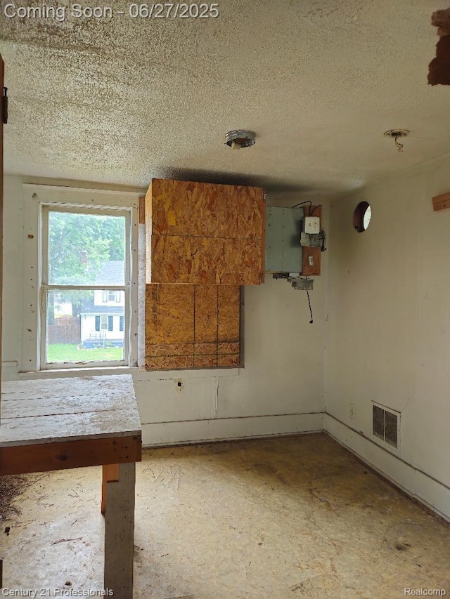 4428 Elizabeth St, Wayne, MI 48184 - spare room with a textured ceiling