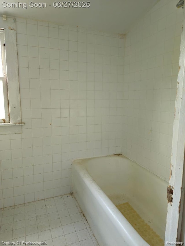 4428 Elizabeth St, Wayne, MI 48184 - full bathroom featuring tile walls, a tub to relax in, and tile patterned flooring