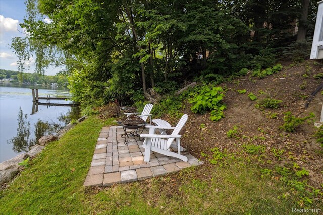 6201 Academy Dr, Brighton, MI 48116 - view of yard featuring a water view, a patio, and a dock