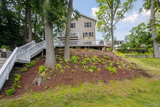 6201 Academy Dr, Brighton, MI 48116 - back of house with a deck and stairs