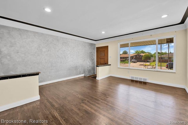 25560 Wexford Ave, Warren, MI 48091 - empty room with wood finished floors and recessed lighting