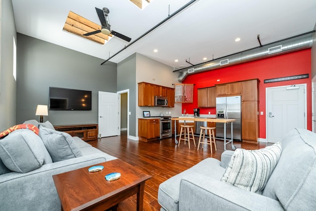 403 State St Unit 6, Saint Joseph, MI 49085 - living room with a towering ceiling, dark wood finished floors, ceiling fan, and recessed lighting