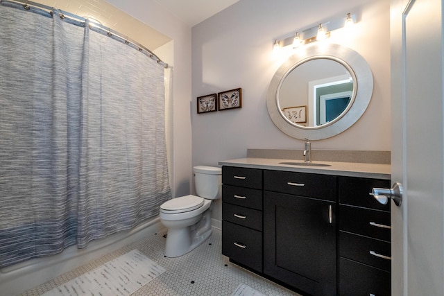 403 State St Unit 6, Saint Joseph, MI 49085 - bathroom featuring vanity, shower / tub combo with curtain, and tile patterned floors