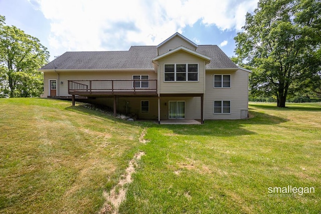 3192 W Sisson Rd, Freeport, MI 49325 - back of property featuring a yard and a deck