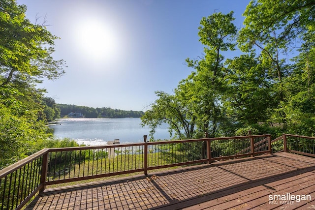 3192 W Sisson Rd, Freeport, MI 49325 - deck featuring a water view