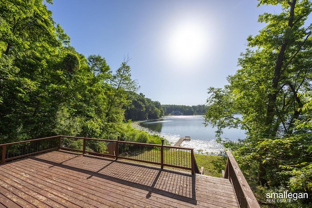 3192 W Sisson Rd, Freeport, MI 49325 - wooden deck featuring a water view