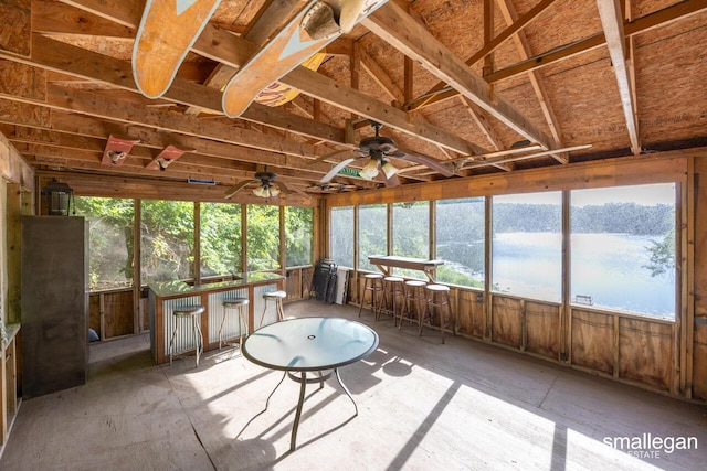 3192 W Sisson Rd, Freeport, MI 49325 - unfurnished sunroom with ceiling fan, plenty of natural light, and a water view