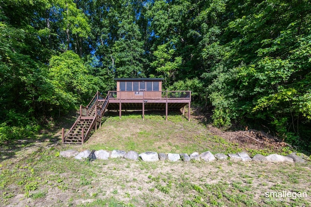 3192 W Sisson Rd, Freeport, MI 49325 - rear view of property featuring stairway and a wooden deck
