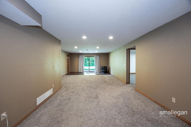 3192 W Sisson Rd, Freeport, MI 49325 - empty room featuring recessed lighting and carpet