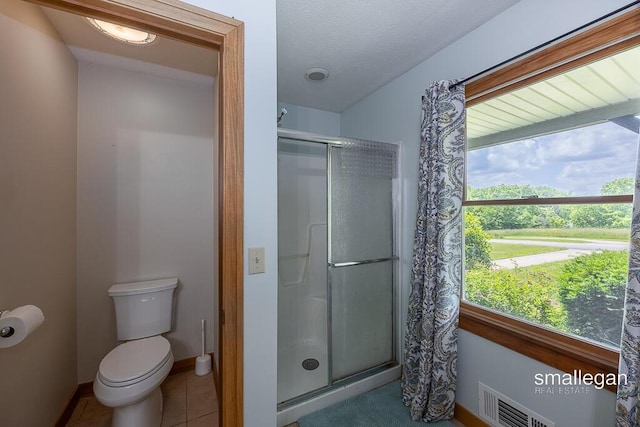 3192 W Sisson Rd, Freeport, MI 49325 - bathroom with a stall shower and tile patterned flooring