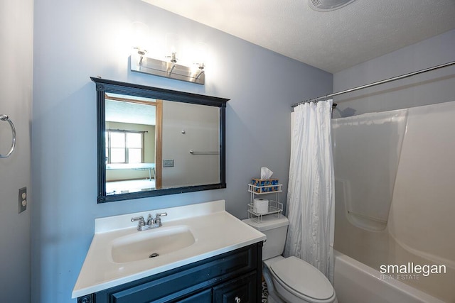 3192 W Sisson Rd, Freeport, MI 49325 - bathroom featuring vanity, shower / bath combo with shower curtain, and a textured ceiling