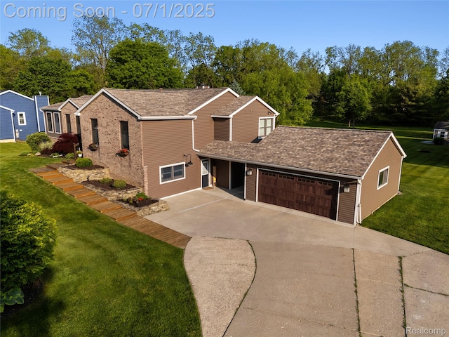 5131 Navajo Trl, Pinckney, MI 48169 - view of front of property with driveway, a garage, a front lawn, and roof with shingles