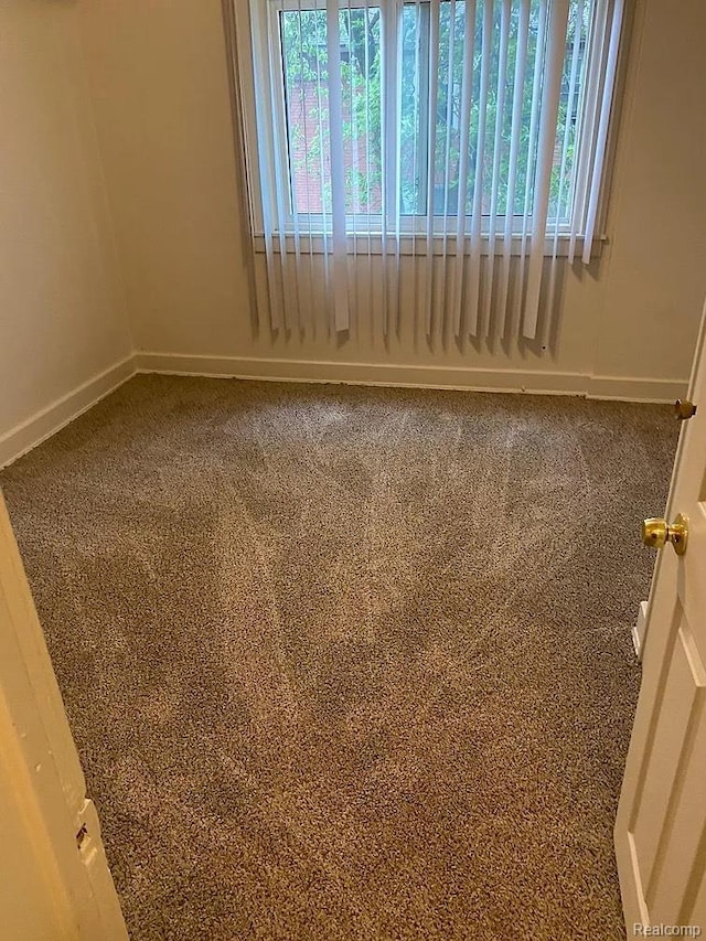 32 S Marshall St, Pontiac, MI 48342 - spare room featuring carpet floors and baseboards