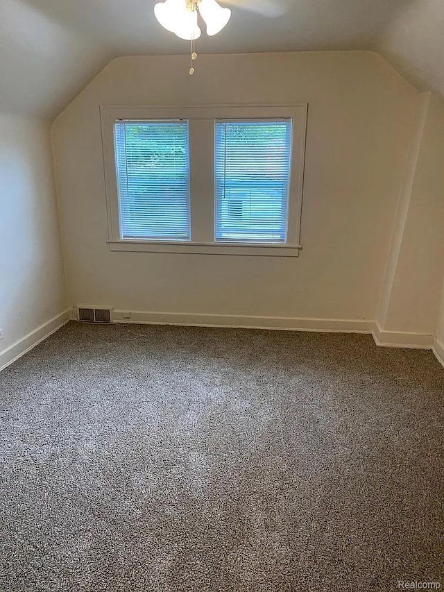 32 S Marshall St, Pontiac, MI 48342 - additional living space featuring lofted ceiling, carpet floors, and a ceiling fan