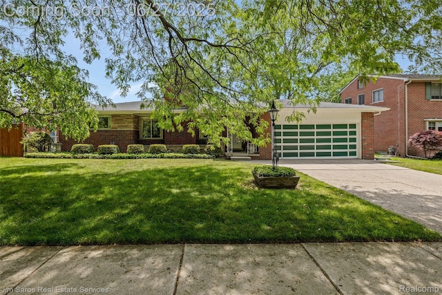 693 Anita Ave, Grosse Pointe Woods, MI 48236 - view of front of home featuring brick siding, an attached garage, concrete driveway, and a front yard
