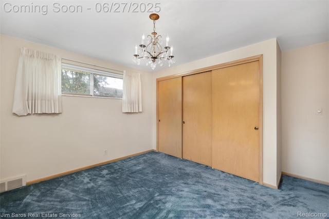 693 Anita Ave, Grosse Pointe Woods, MI 48236 - unfurnished bedroom with a chandelier, carpet flooring, and a closet