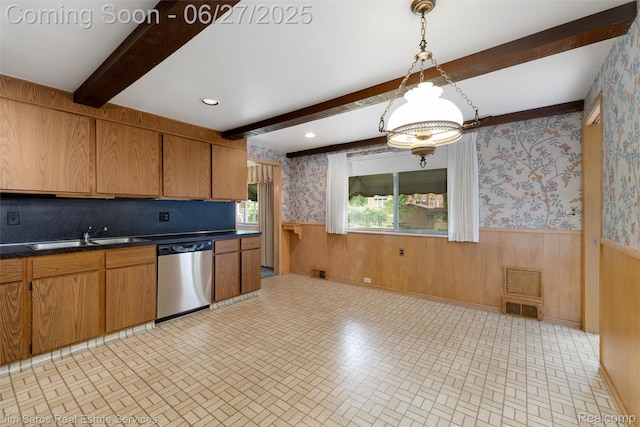 693 Anita Ave, Grosse Pointe Woods, MI 48236 - kitchen with stainless steel dishwasher, wallpapered walls, a wainscoted wall, dark countertops, and beamed ceiling