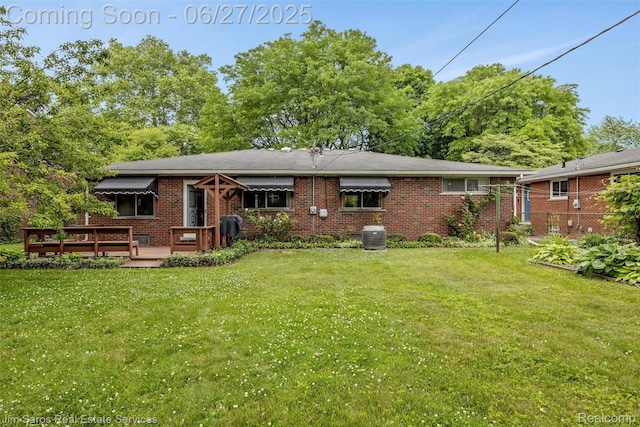 693 Anita Ave, Grosse Pointe Woods, MI 48236 - back of house with a wooden deck and brick siding