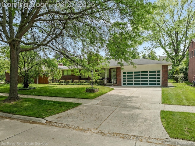 693 Anita Ave, Grosse Pointe Woods, MI 48236 - mid-century modern home featuring a garage, concrete driveway, brick siding, and a front lawn
