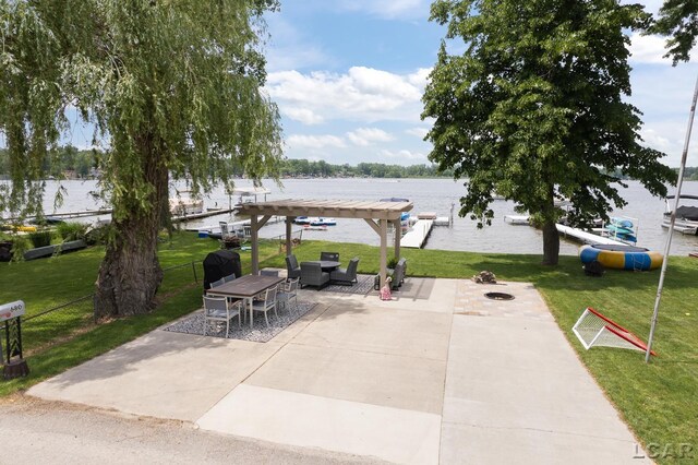 680 Breyman Hwy, Tipton, MI 49287 - view of patio featuring a water view, a pergola, and an outdoor living space