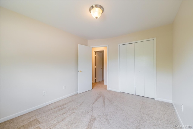 10228 Nancys Blvd Unit 33, Grosse Ile, MI 48138 - unfurnished bedroom with carpet flooring and a closet