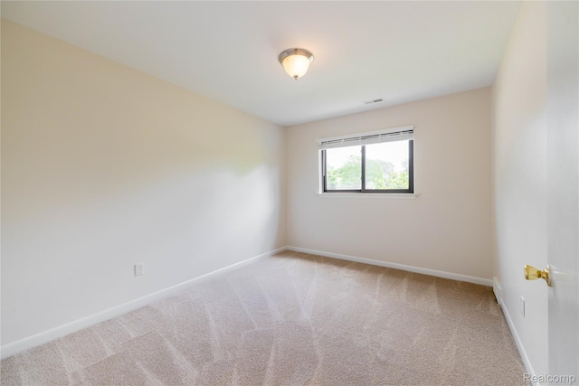 10228 Nancys Blvd Unit 33, Grosse Ile, MI 48138 - empty room with carpet and baseboards