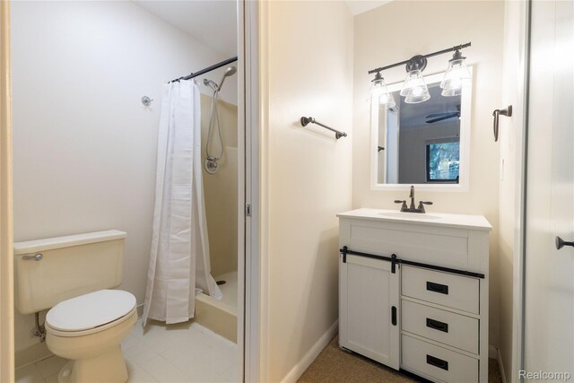 10228 Nancys Blvd Unit 33, Grosse Ile, MI 48138 - bathroom with vanity, a shower with shower curtain, and tile patterned flooring