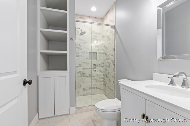 950 Whitetail Ct, Ionia, MI 48846 - full bathroom with vanity, a shower stall, and marble look tiles