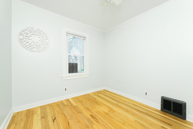1608 Cambridge Dr, Kalamazoo, MI 49001 - spare room featuring ornamental molding, hardwood / wood-style flooring, and a ceiling fan