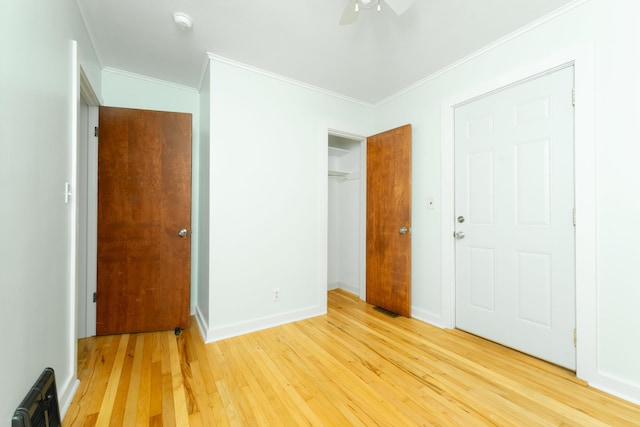 1608 Cambridge Dr, Kalamazoo, MI 49001 - unfurnished bedroom featuring light wood-style floors, ornamental molding, a closet, and ceiling fan