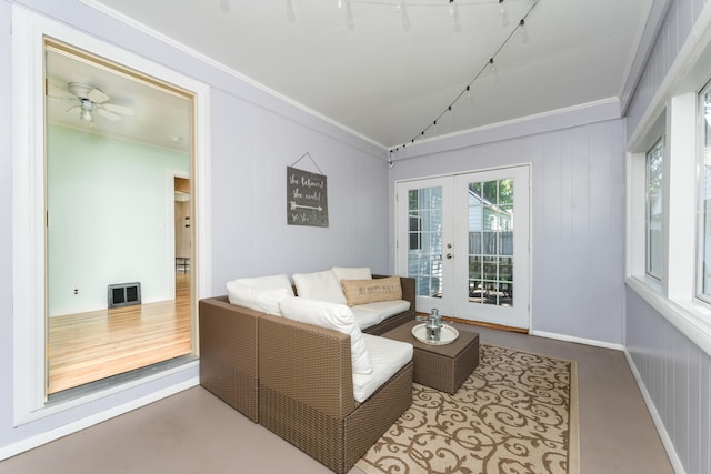 1608 Cambridge Dr, Kalamazoo, MI 49001 - living room with french doors, crown molding, vaulted ceiling, and ceiling fan