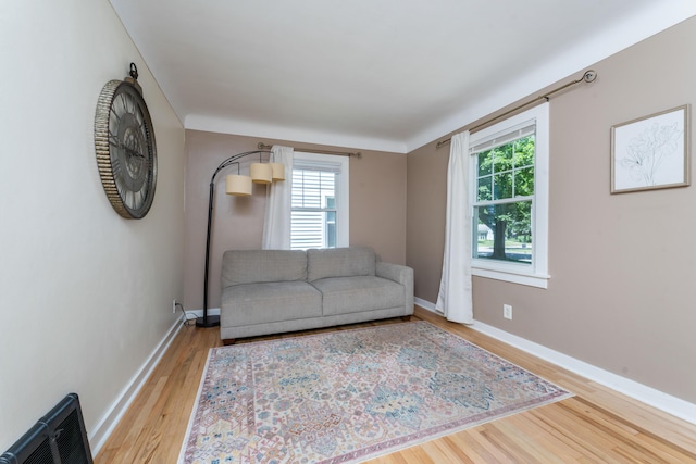 1608 Cambridge Dr, Kalamazoo, MI 49001 - living area featuring wood finished floors and healthy amount of natural light