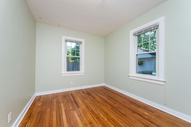 1608 Cambridge Dr, Kalamazoo, MI 49001 - unfurnished room with hardwood / wood-style flooring and baseboards