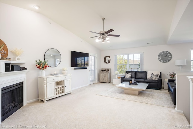 29611 Fox Run Cir, Warren, MI 48092 - living area with light colored carpet, a fireplace, a ceiling fan, and high vaulted ceiling